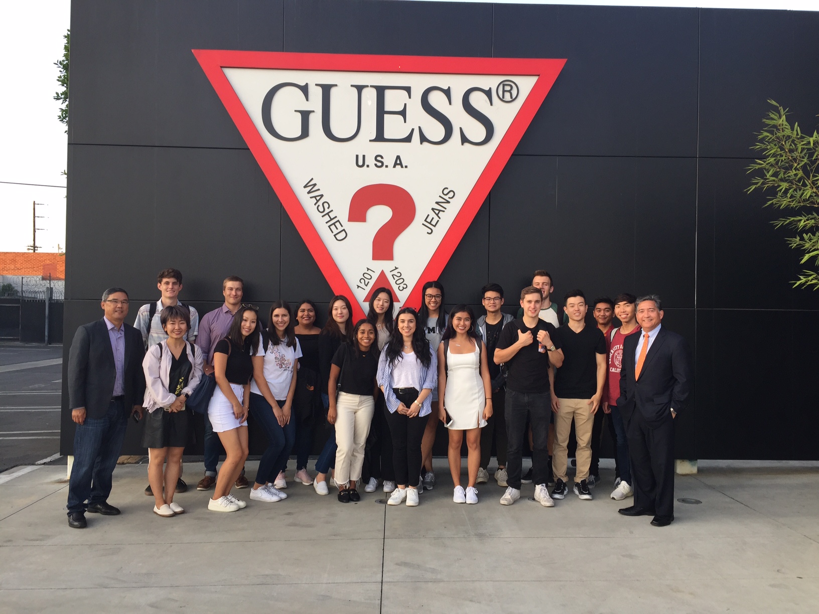 Professor Ching visiting Guess with students from ACCT/BUAD 385x Introduction to Risk Management and Insurance